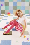 Lisa Kudrow wearing pink tights